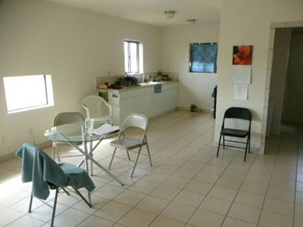 A picture containing floor, wall, indoor, chair

Description automatically generated