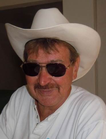 A person wearing a white hat and sunglasses

Description automatically generated with medium confidence